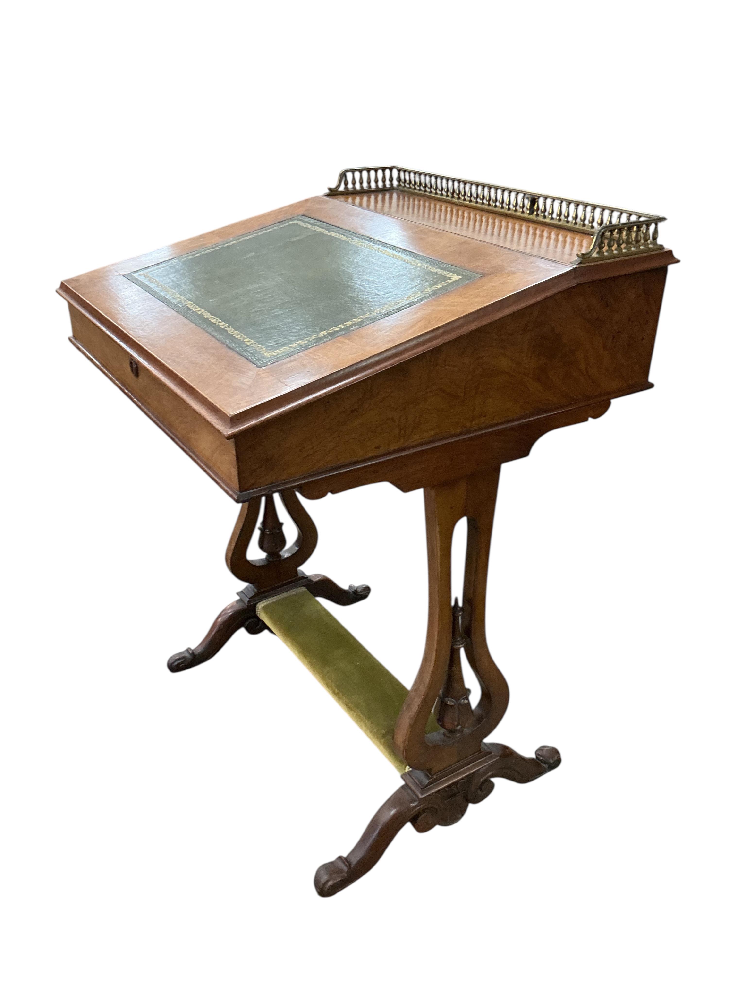 An early Victorian walnut Davenport, width 58cm, depth 59cm, height 82cm